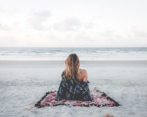 Girl sitting beach