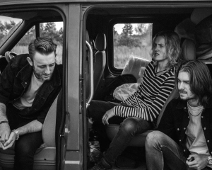 Boys sitting in car