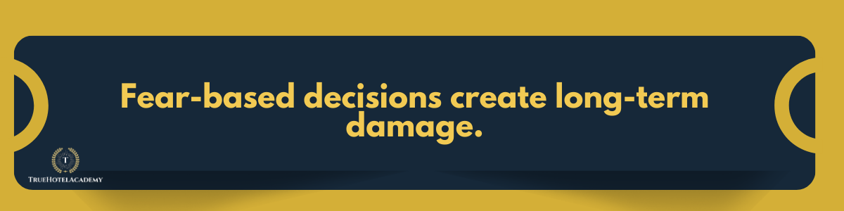 A banner that reads 'Fear-Based Decisions Create Long-Term Damage'