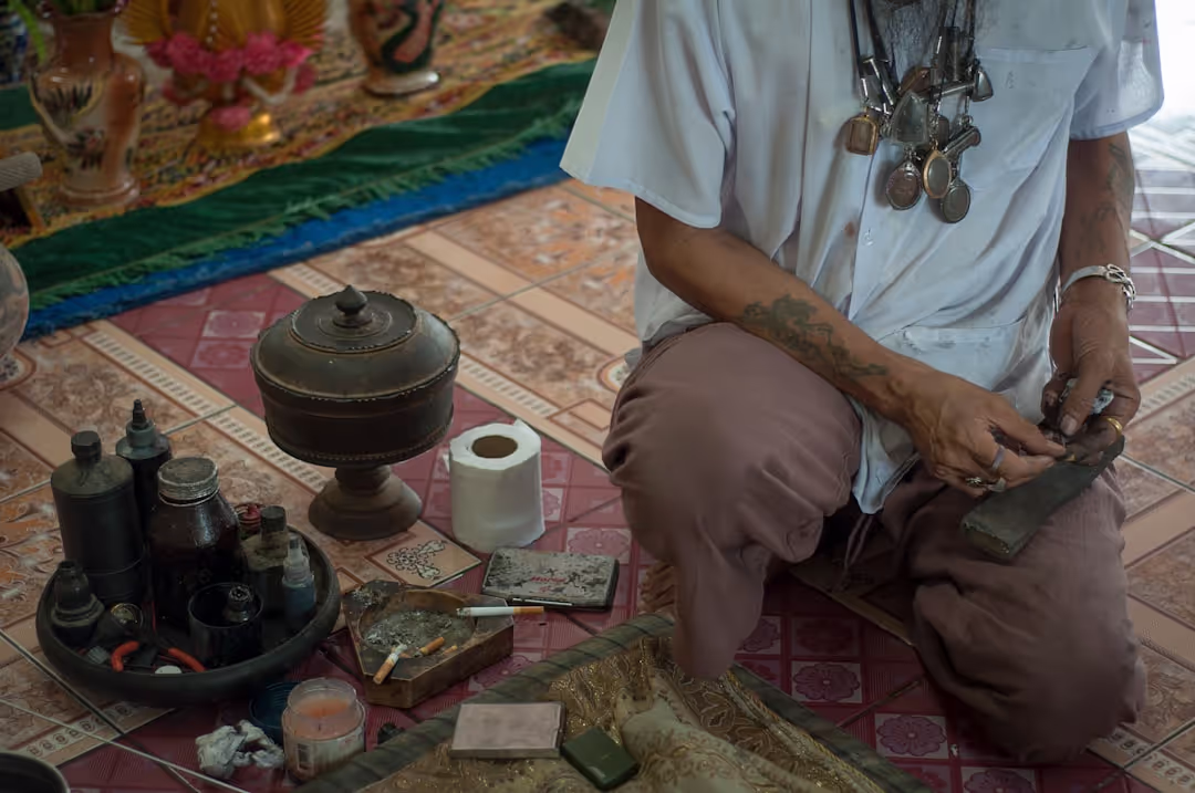 Person meditating with sound bowls