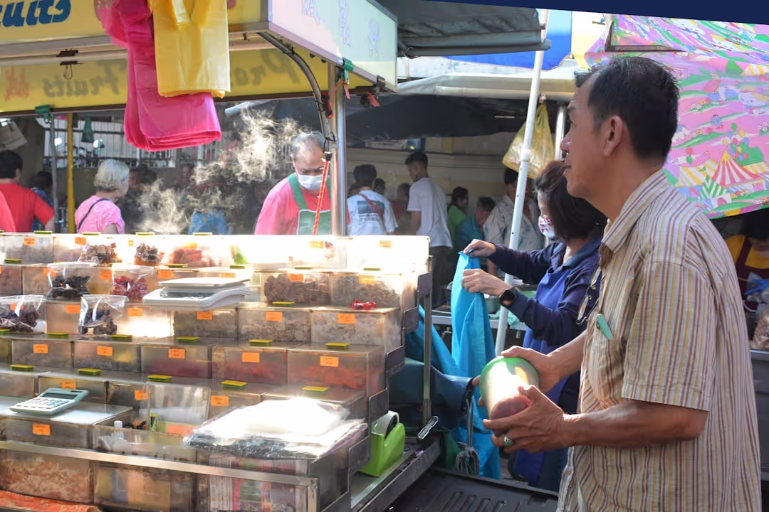 Da Nang Insider team exploring a local market, showcasing authentic local experiences