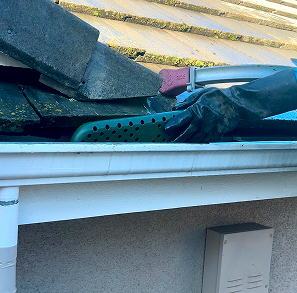 Gutter stick downspout filter installation