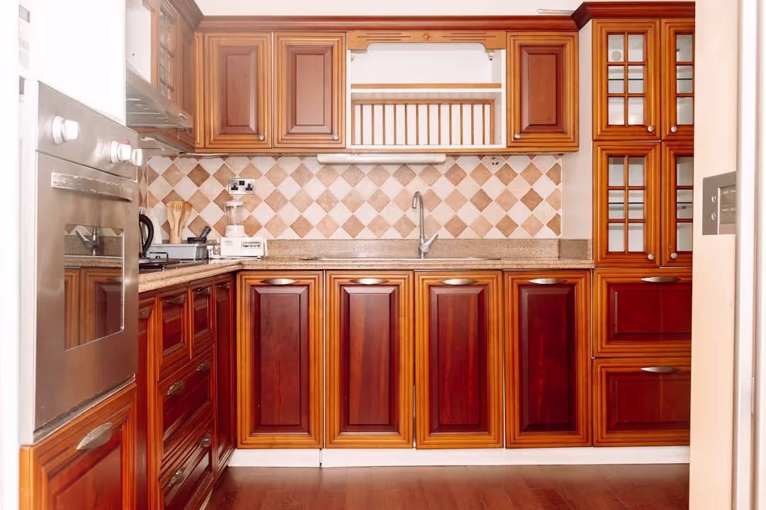 Elegant traditional kitchen with dark wood cabinets