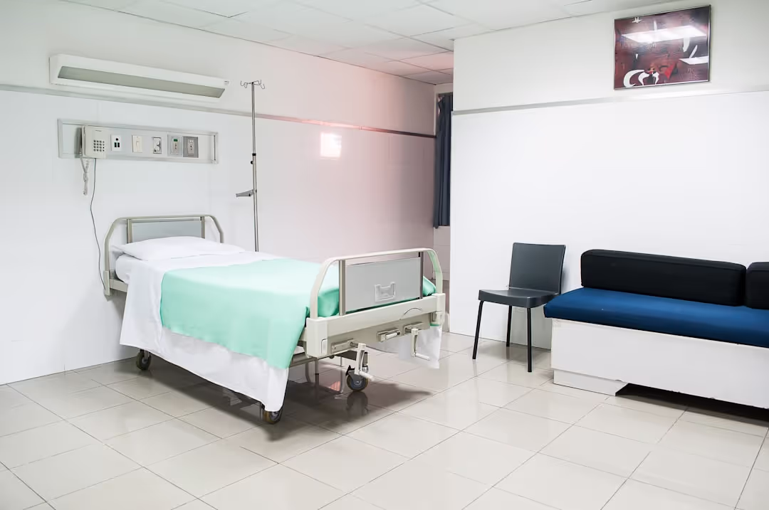 A bright and modern hospital rehabilitation area with physical therapy equipment.