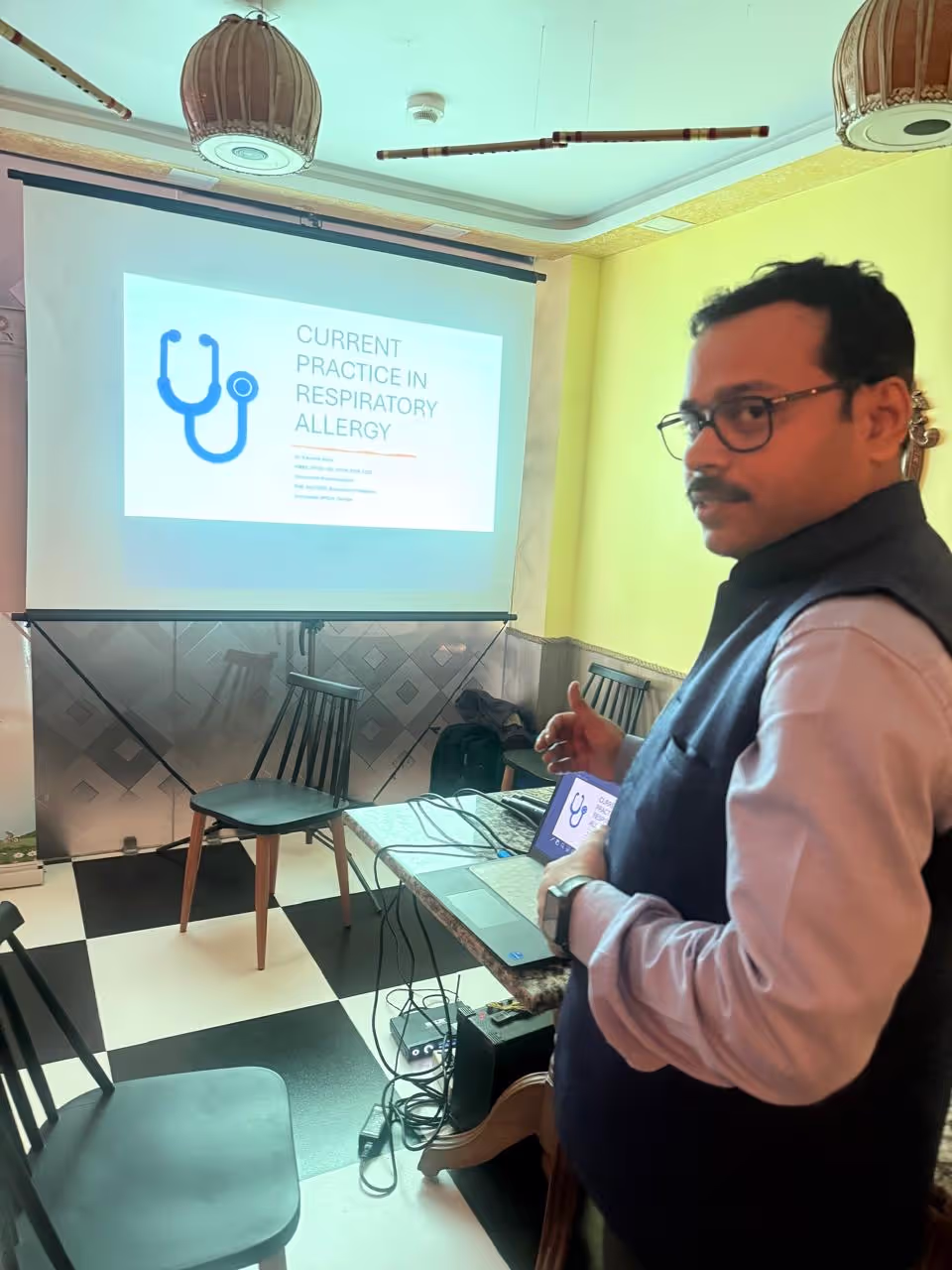 A workshop conducted by PulmoCare Center on managing asthma, with attendees participating actively.