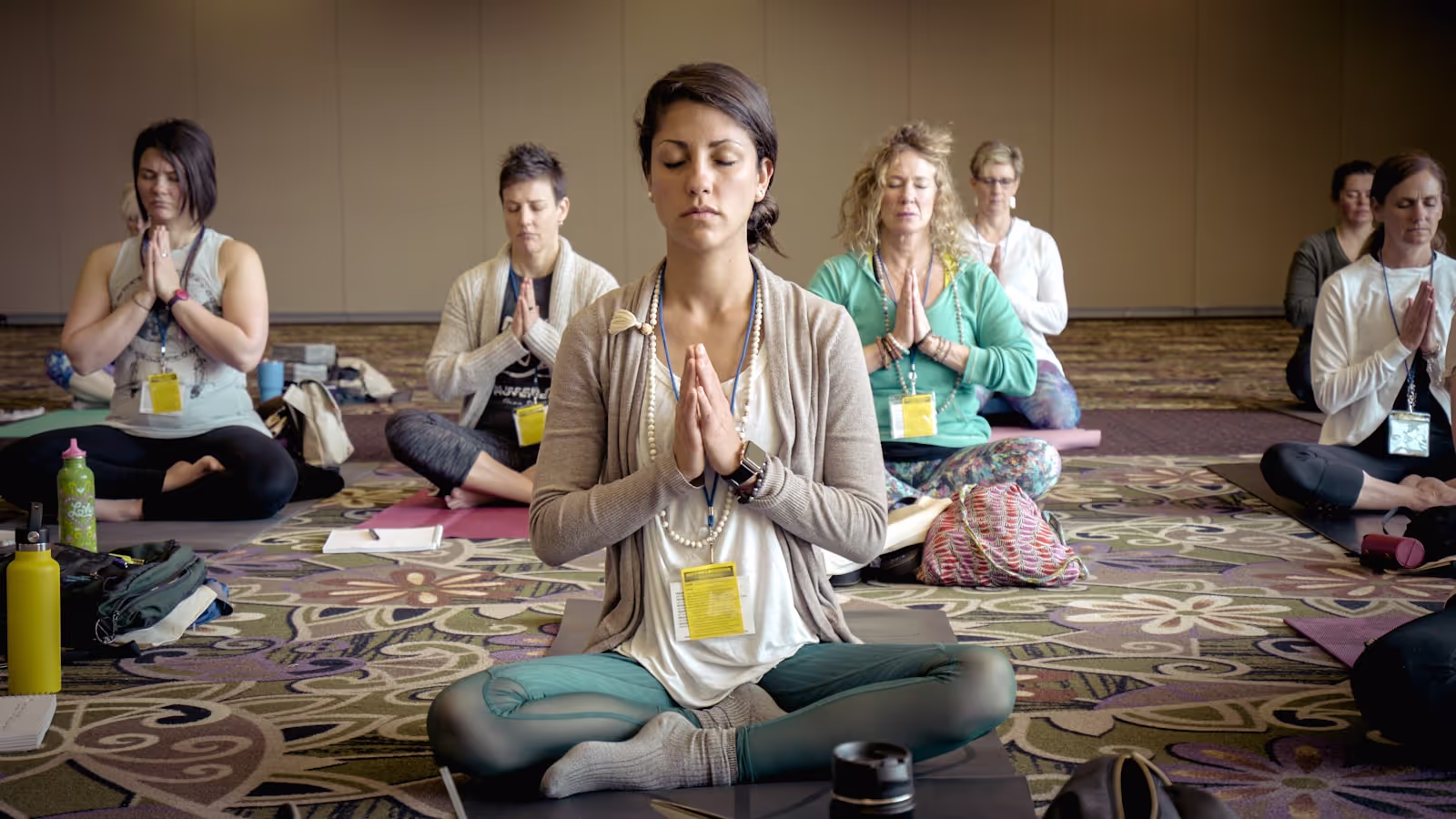 Diverse individuals engaged in mindfulness and contemplation for personal growth