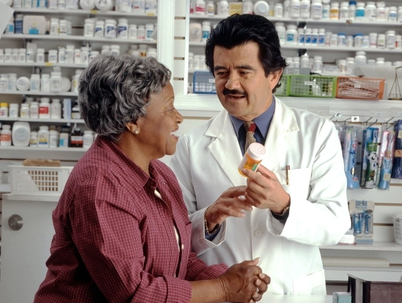 Doctor explaining medicine to patient