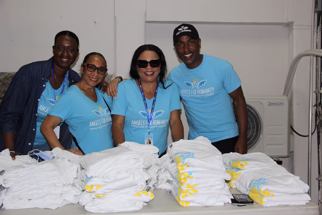 A group of diverse volunteers helping at a community health event