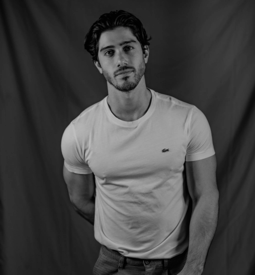 Man posing in white tshirt