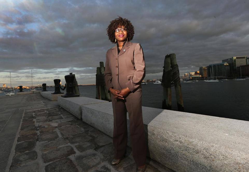Dr. Atyia Martin Standing near the New England Aquarium 