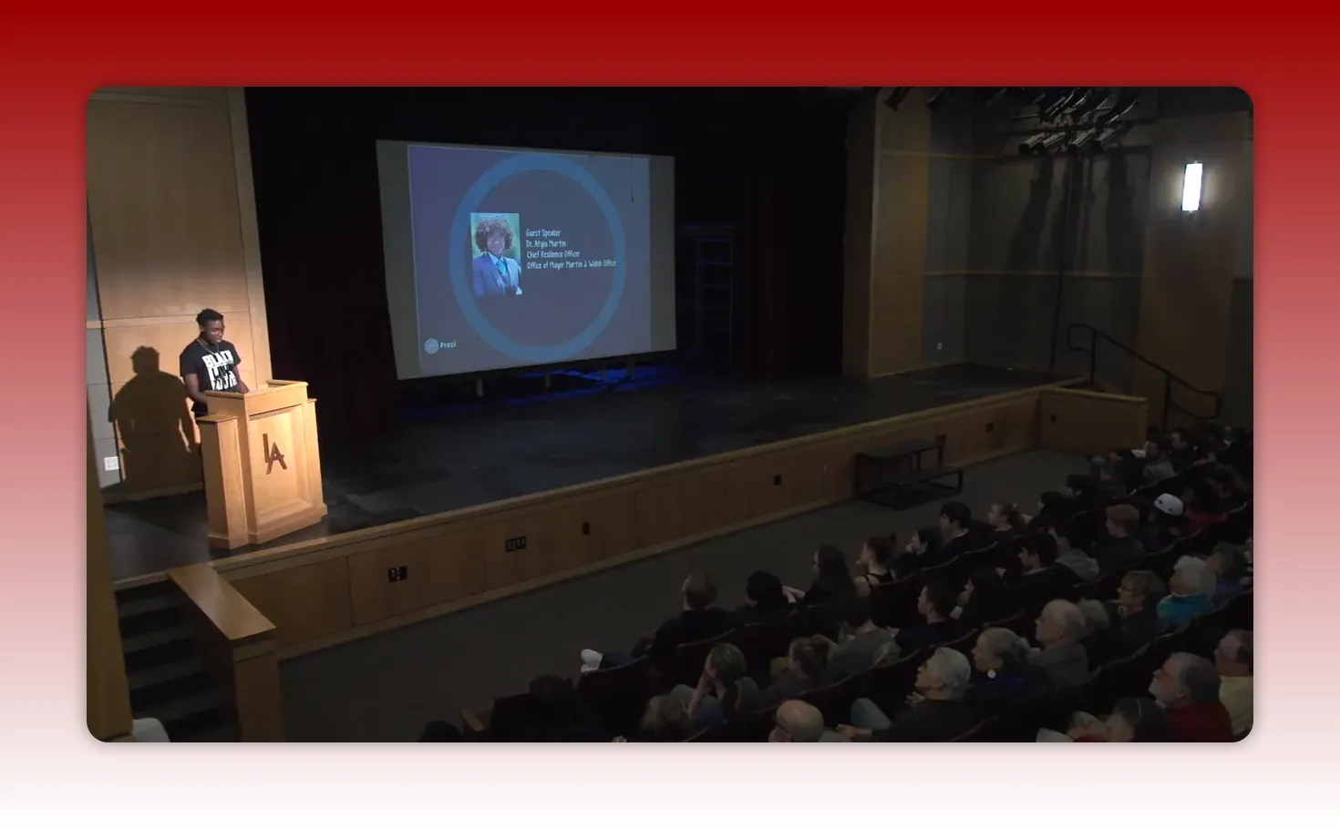 Lawrence Academy Screenshot of young person introducing Dr. Atyia Martin with her image and information on the screen