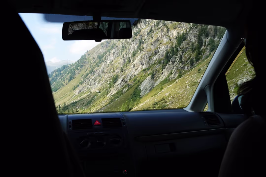 Koncaroo Adventures van driving through a scenic European road
