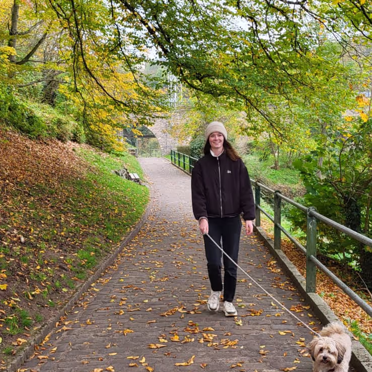 Caro walking the dog in Luxembourg
