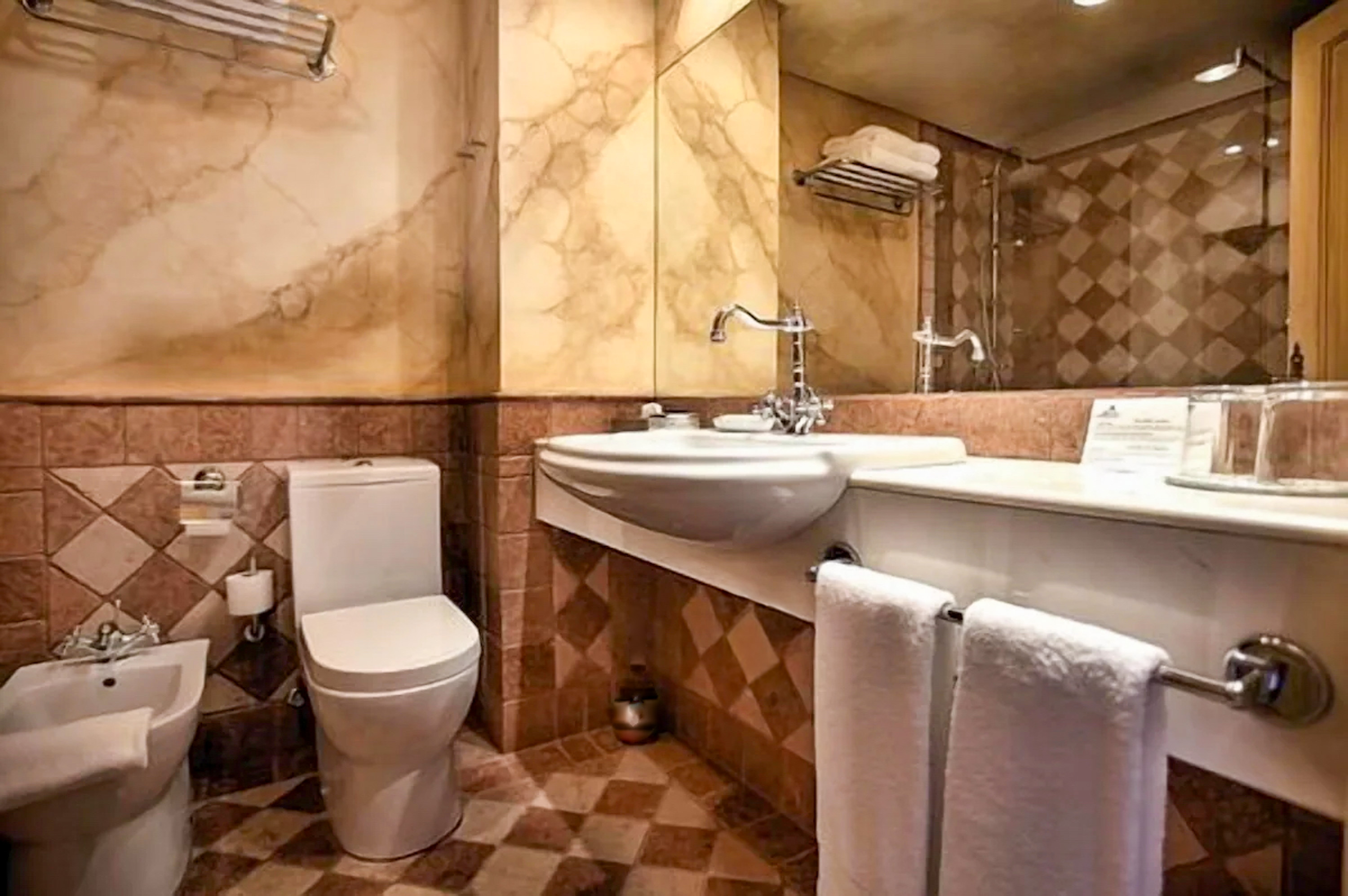 Modern spa-inspired bathroom with sleek fixtures and premium toiletries