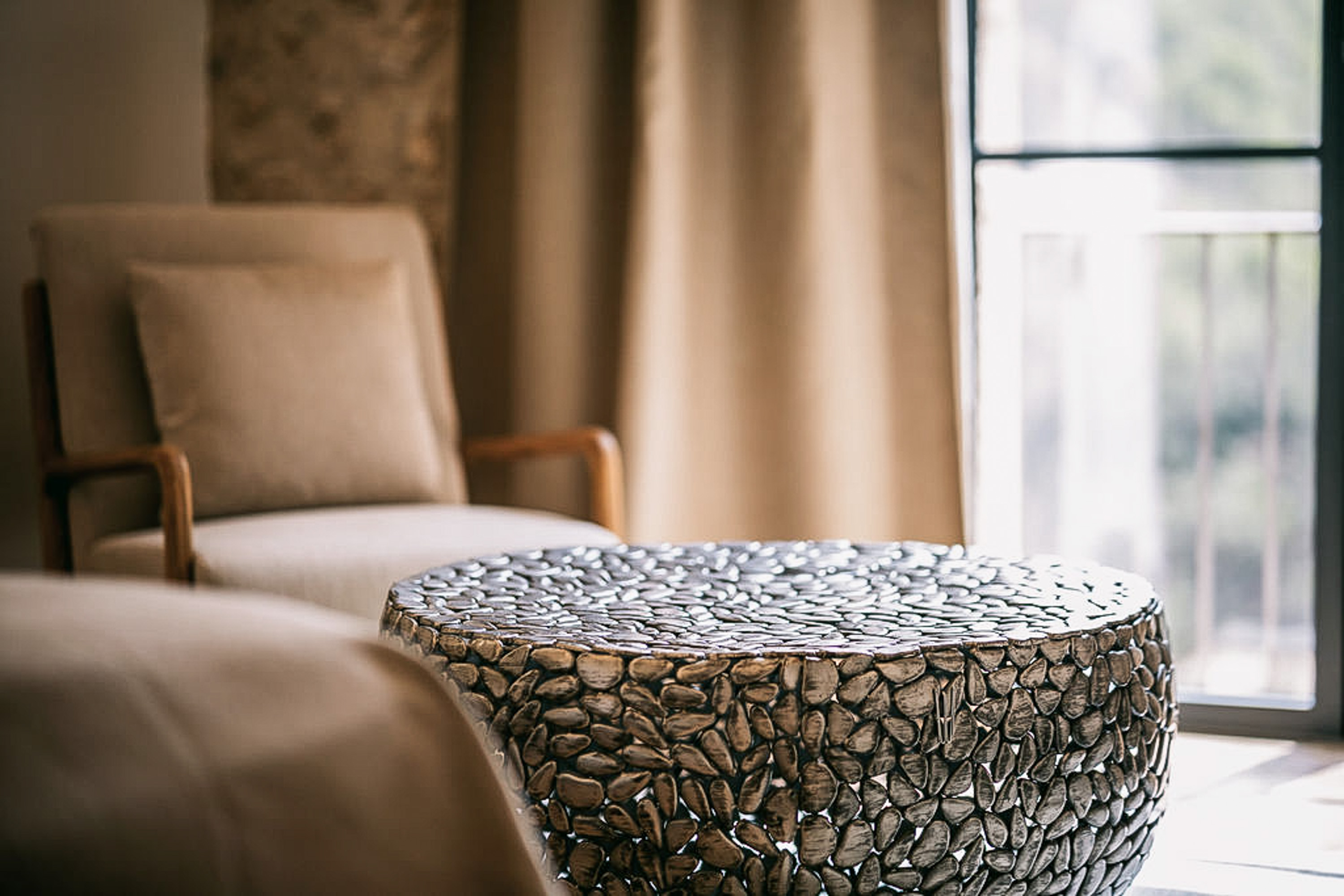 Luxurious king-size bed with pristine white linens and decorative pillows