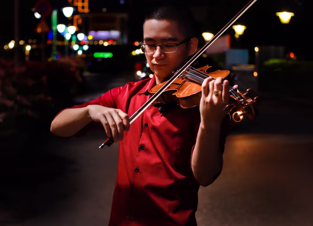 Student performing on a violin