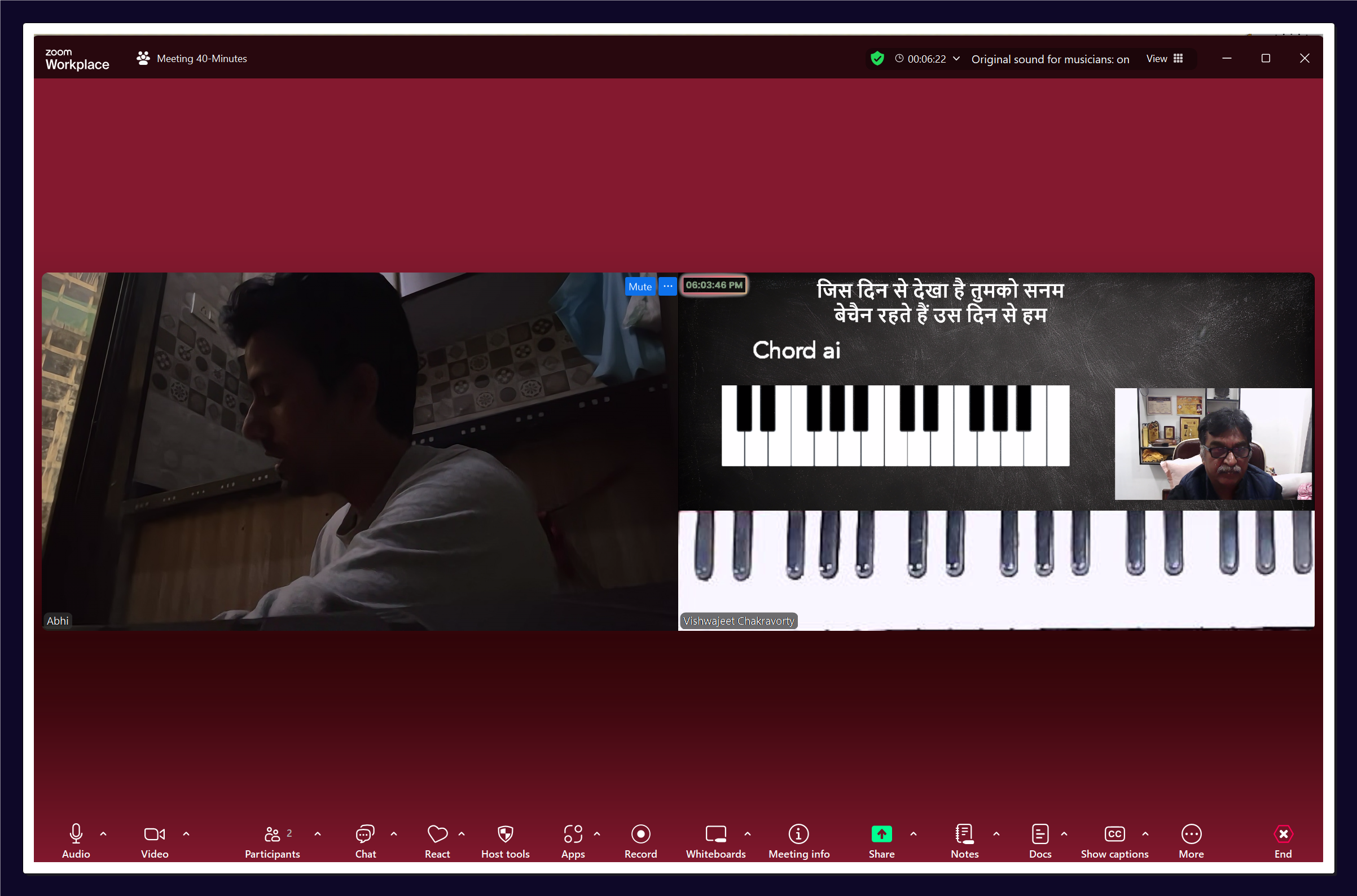A small group of students laughing and singing together, enjoying a vocal practice session.