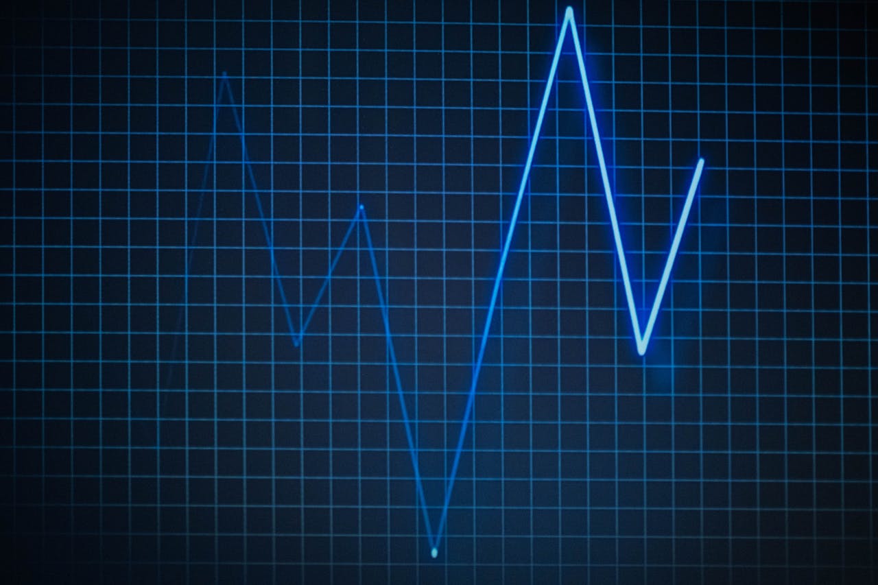 ECG graph on a grid background symbolizing heartbeat and medical data