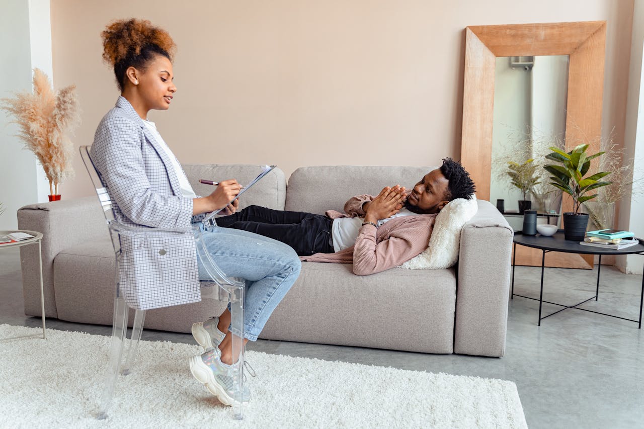 Patient and therapist in a modern therapy session indoors
