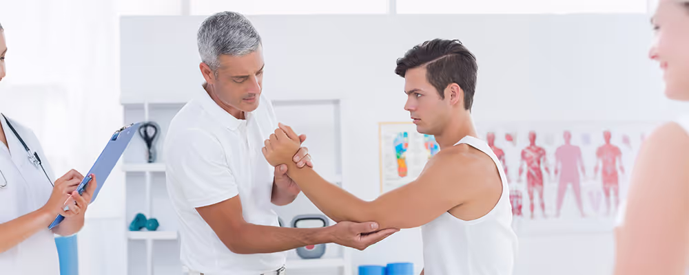 Doctor with patient giving treatment
