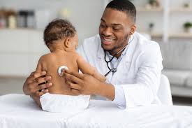 A friendly pediatrician performing a well-child check-up on a young patient, representing the dual nature of preventive and acute care billing.