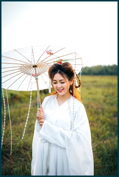 Chinese girl holding traditional umbrella  