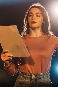 Girl holding audition script